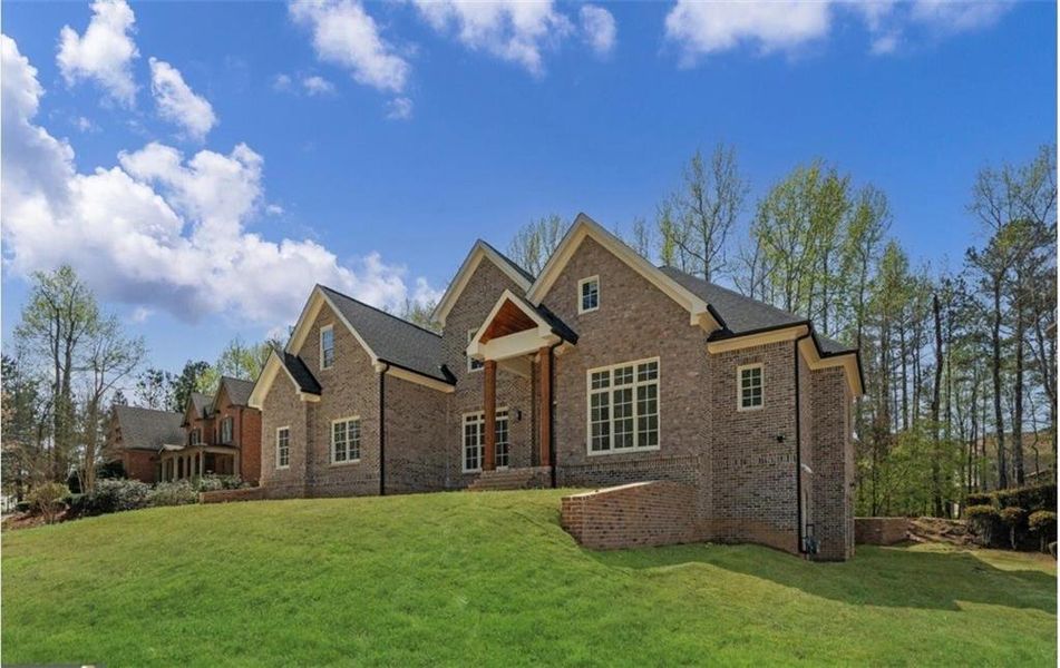 Front exterior of a new home in Brookmont, Douglasville, GA, highlighting curb appeal (Image 27).