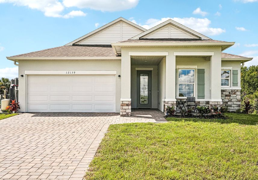 Representative exterior photo of a completed home built from the Melody by Maronda Homes in Englewood, Port Charlotte, FL (Image 22).