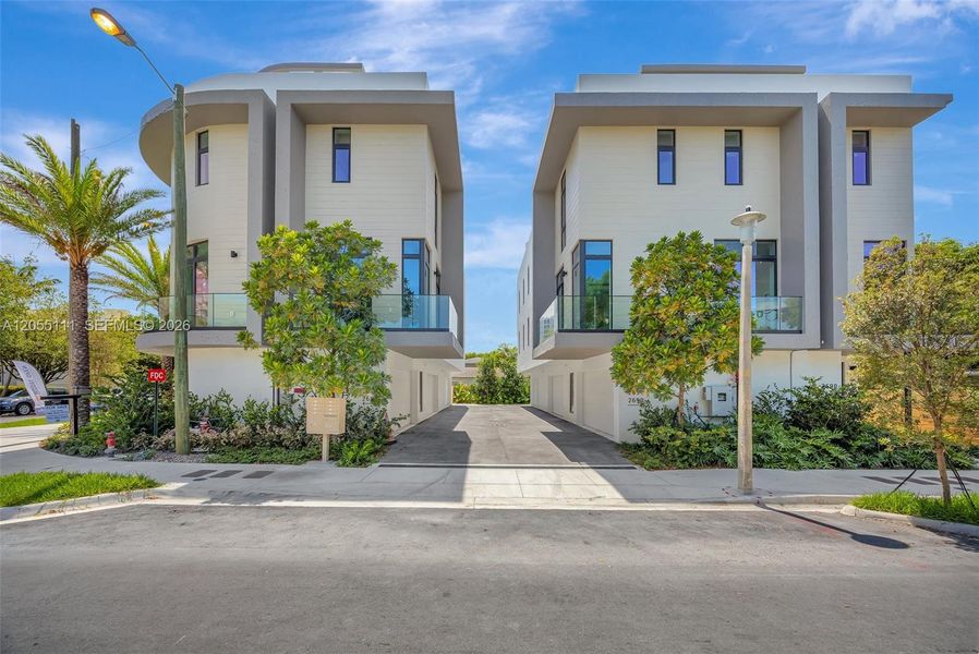 Front exterior of a new home in , Miami, FL, highlighting curb appeal (Image 1). Front exterior of a new home in , Miami, FL, highlighting curb appeal (Image 1).