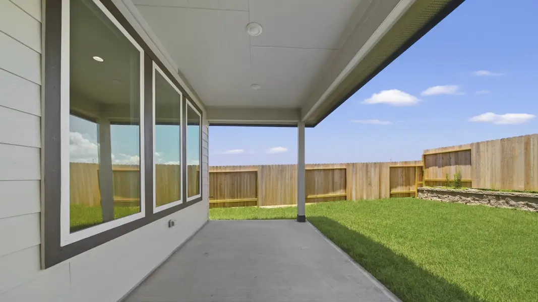 Exterior details and patio area of a home in Mill Creek Estates, Magnolia (Image 3). Exterior details and patio area of a home in Mill Creek Estates, Magnolia (Image 3).