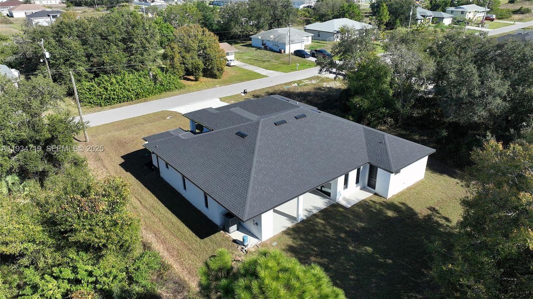 Front exterior of a new home in , Lehigh Acres, FL, highlighting curb appeal (Image 33).
