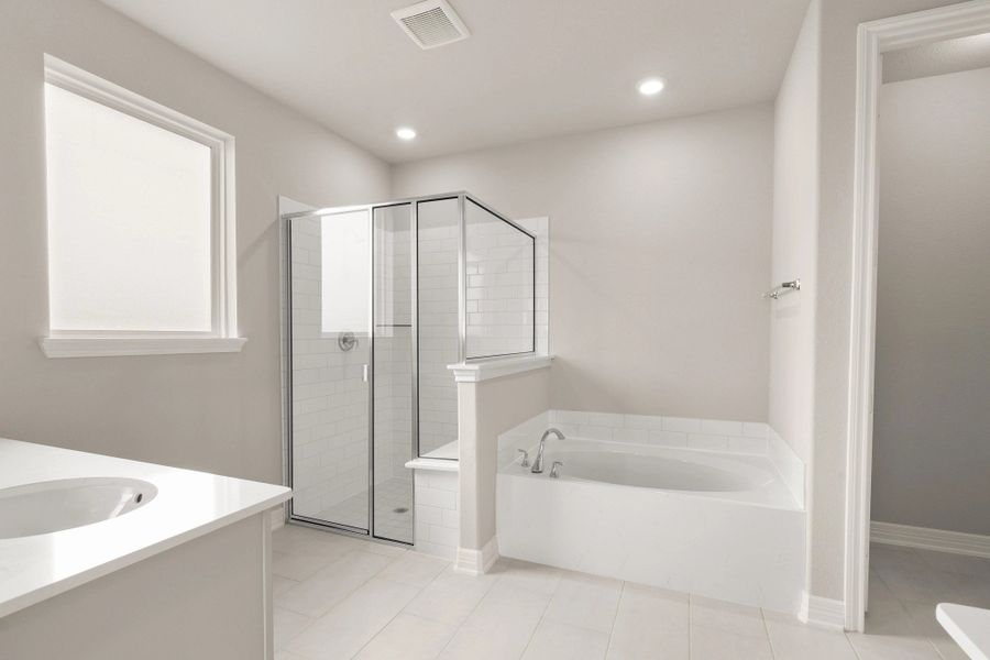 Primary bathroom. Sample product photo. Actual exterior and interior selections may vary by homesite. Photo may be virtually staged.