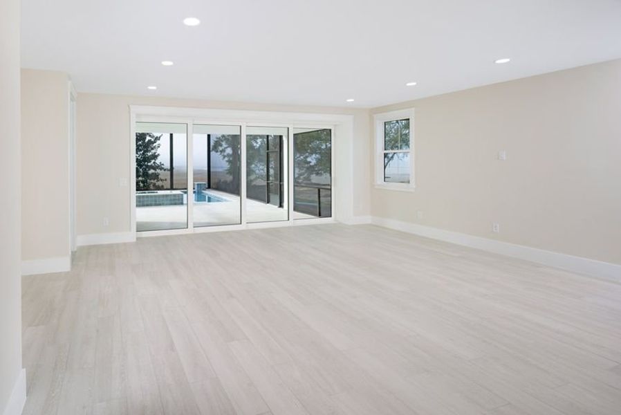 Representative unfurnished interior of a home built from the Grand Wayfarer by Minto Communities in Latitude Margaritaville Watersound, Panama City Beach (Image 13).