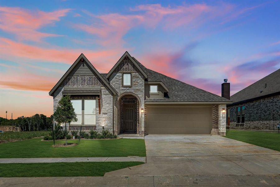 Front exterior of a new home in Sunset Ridge, Alvarado, TX, highlighting curb appeal (Image 2).