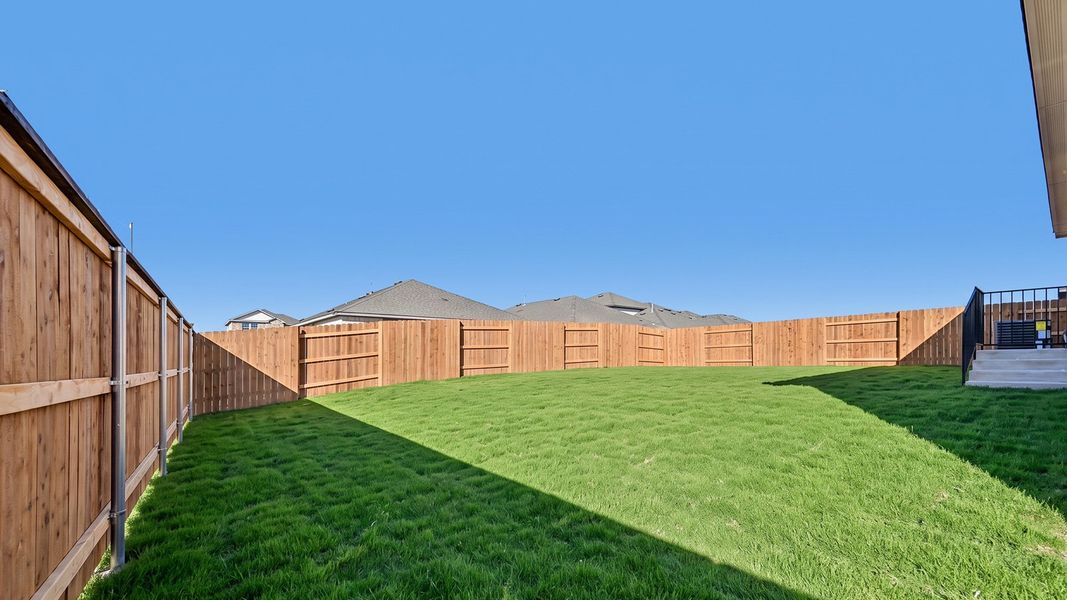 Exterior details and patio area of a home in Bar W Ranch, Leander (Image 22). Exterior details and patio area of a home in Bar W Ranch, Leander (Image 22).
