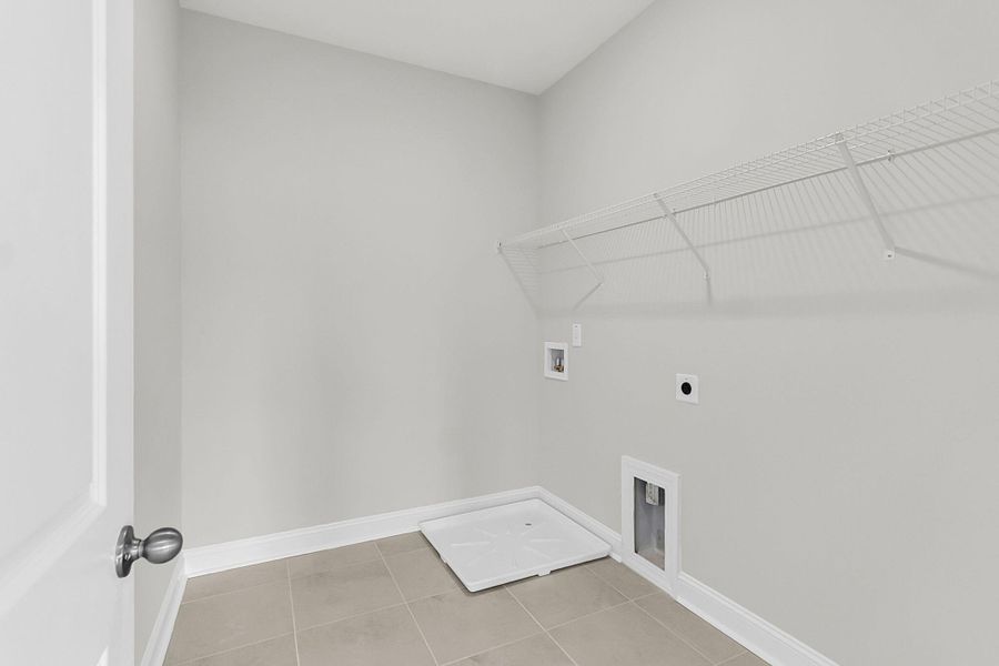 Spacious, unfurnished interior of a new home in Tidewater at Lakes of Cane Bay, Summerville (Image 53).