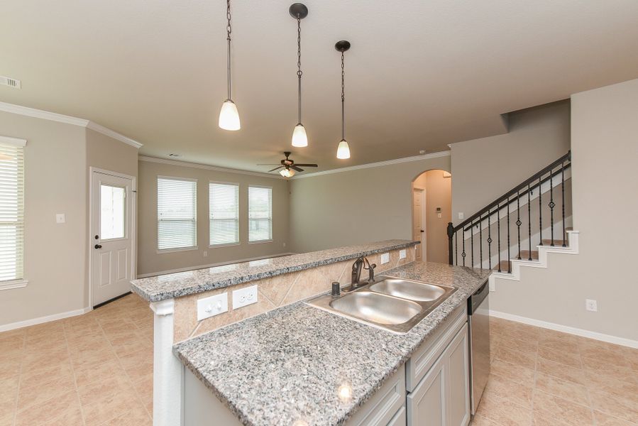 Representative furnished interior of a home built from the Floor Plan 2201 by Colina Homes in Grand Magnolia, Magnolia (Image 10).
