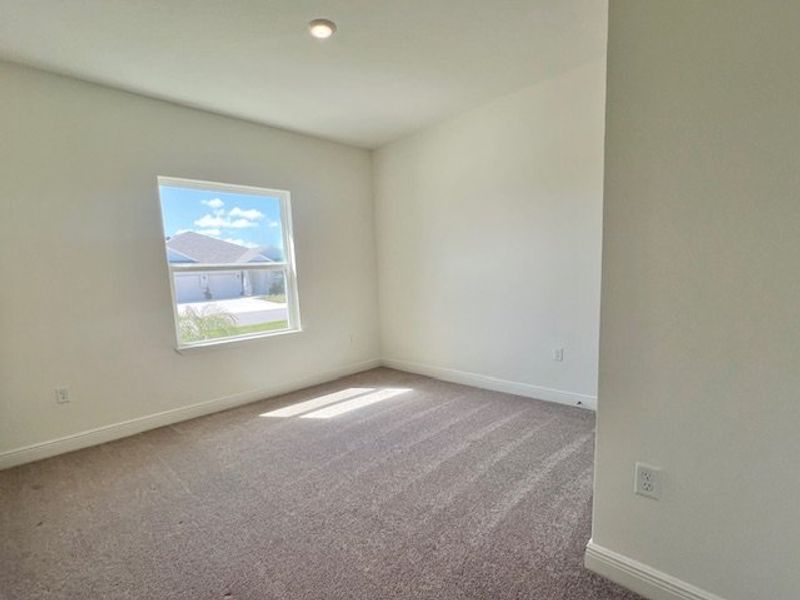 Spacious, unfurnished interior of a new home in Lakes At St Sebastian, Micco (Image 23).