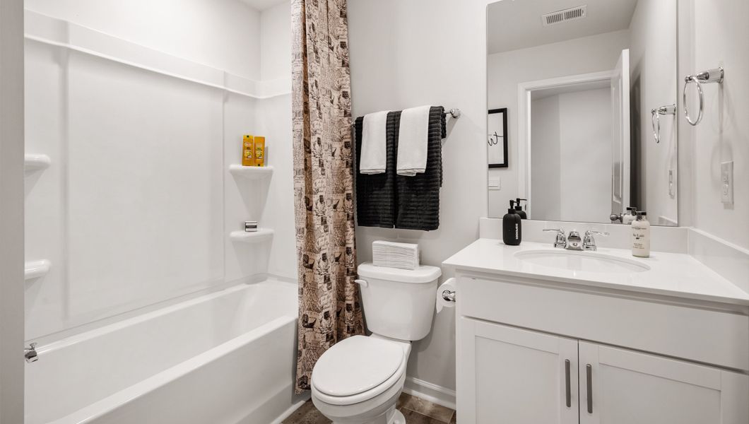 Representative furnished interior of a home built from the Newton by D.R. Horton in Brookside Ridge Townhomes, Greer (Image 19).