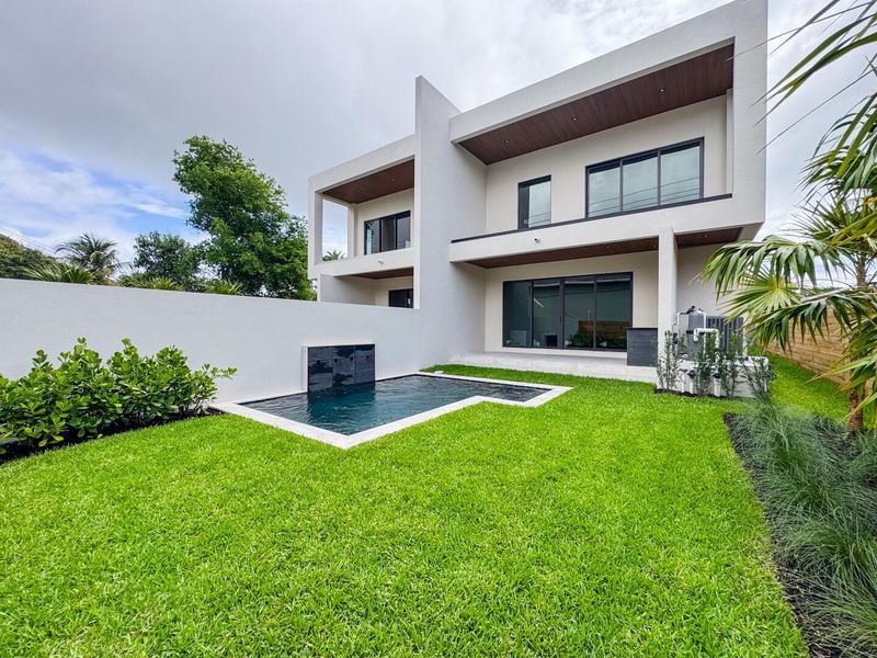 (as of April 8, 2026) west-facing backyard with privacy wall, 11x14 spa pool, and well landscaped