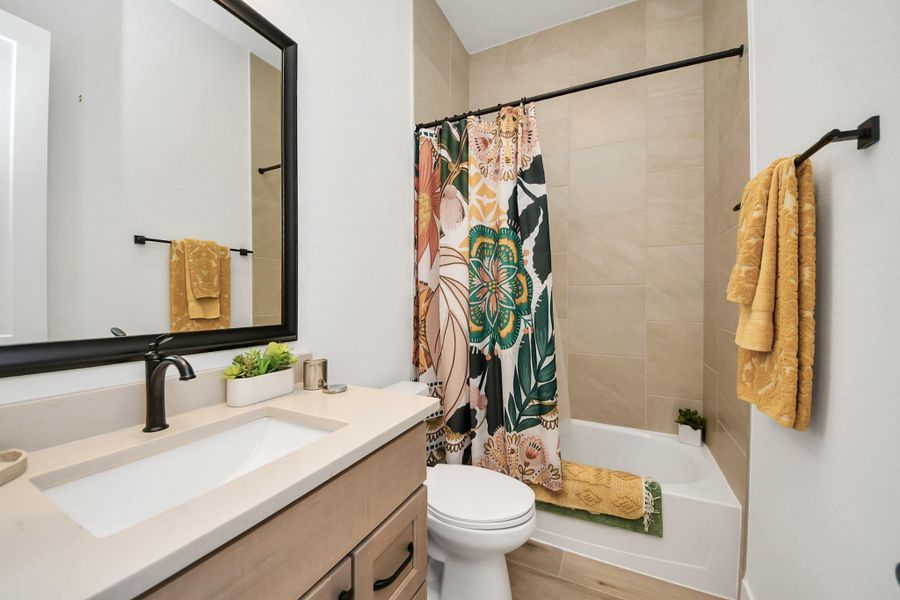Sleek quartz counter top in this bathroom Sleek quartz counter top in this bathroom