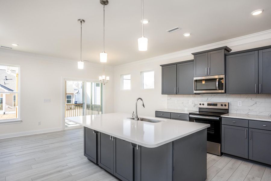 Furnished interior view inside a new home in 1158 Place, Wilson (Image 7).