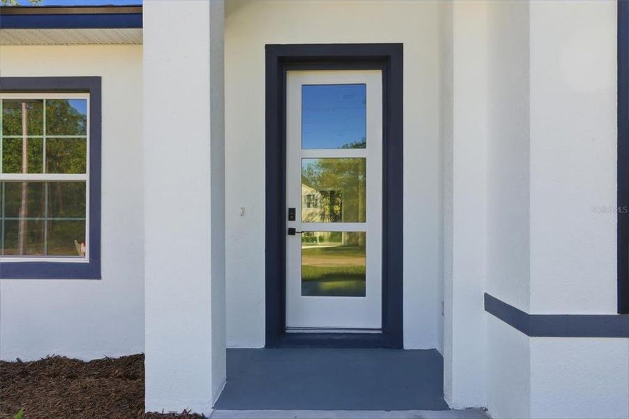 Exterior details and patio area of a home in , Citrus Springs (Image 23).