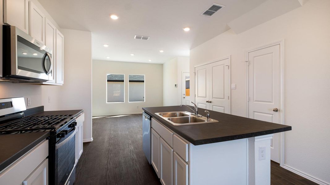 Furnished interior view inside a new home in Valverde, Bastrop (Image 5).