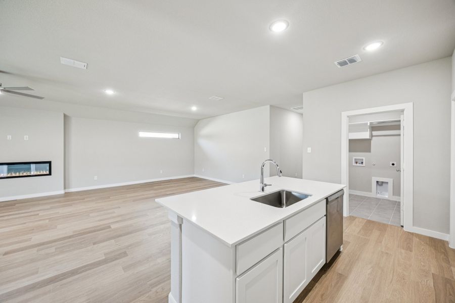 First Floor in the Oscar home plan by Trophy Signature Homes – REPRESENTATIVE PHOTO First Floor in the Oscar home plan by Trophy Signature Homes – REPRESENTATIVE PHOTO