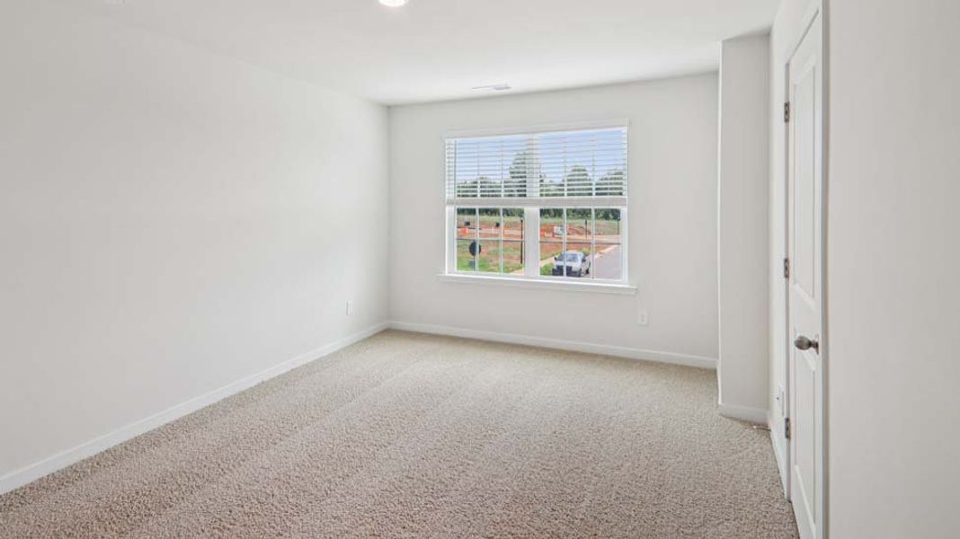Representative unfurnished interior of a home built from the Pearson by D.R. Horton in Clark Creek Landing Townhomes, Lincolnton (Image 12).