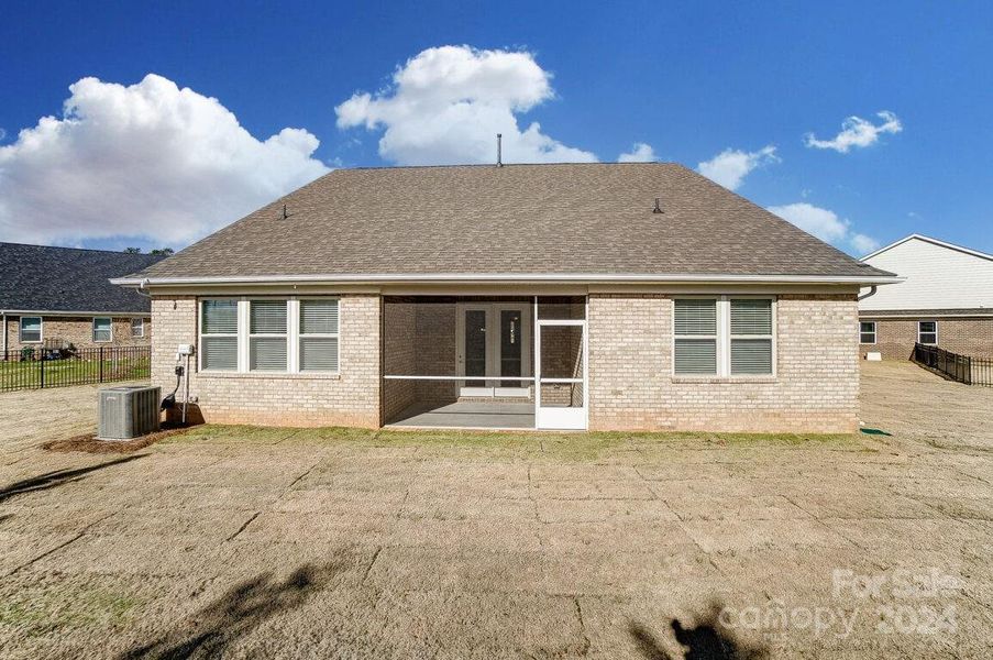 Rear View of Home with Screened Porch-Picture Similar to Subject Property