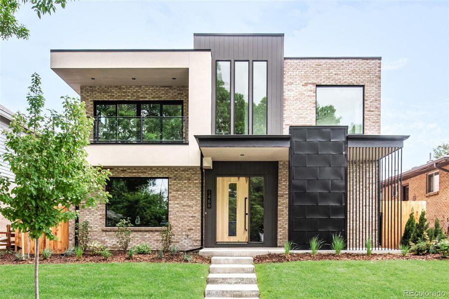 Front exterior of a new home in , Denver, CO, highlighting curb appeal (Image 1).