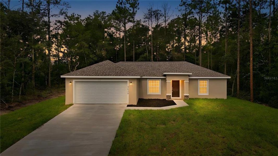 Front exterior of a new home in , Citrus Springs, FL, highlighting curb appeal (Image 20).