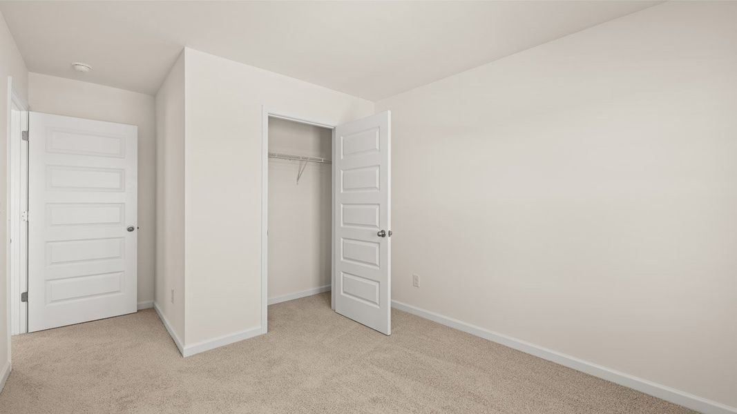 Representative unfurnished interior of a home built from the Aisle by D.R. Horton in Shoal Creek, Hampton (Image 28).
