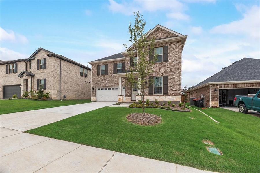 Front exterior of a new home in Villages of Hurricane Creek, Anna, TX, highlighting curb appeal (Image 19).