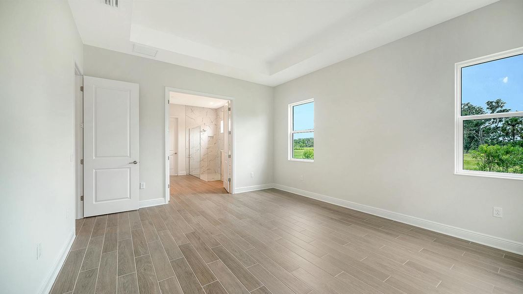 Spacious, unfurnished interior of a new home in Canoe Creek Real Estate and Homes for Sale in Parrish, FL - Neal Communities, Parrish (Image 42).