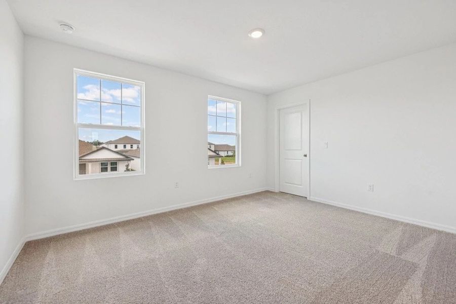 Spacious, unfurnished interior of a new home in Northlake at Ovation, Winter Garden (Image 37).