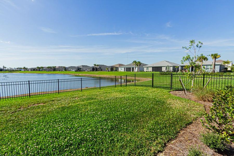 Front exterior of a new home in , Punta Gorda, FL, highlighting curb appeal (Image 27).