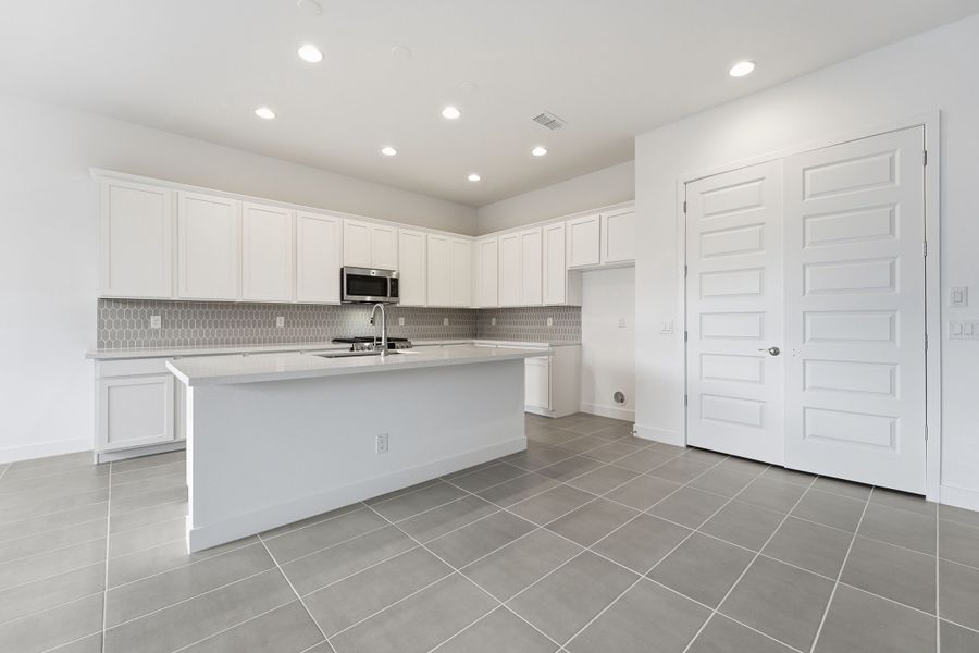 Representative furnished interior of a home built from the Bedford by Taylor Morrison in Combs Ranch, Queen Creek (Image 4). Representative furnished interior of a home built from the Bedford by Taylor Morrison in Combs Ranch, Queen Creek (Image 4).