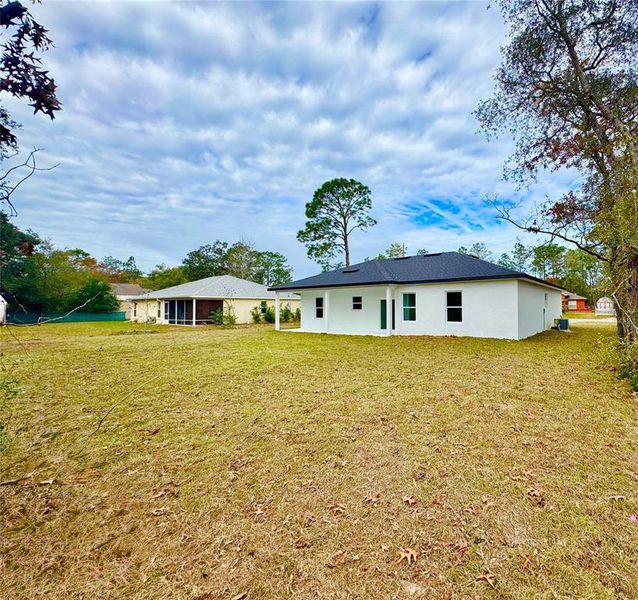 Exterior details and patio area of a home in , Citrus Springs (Image 21).
