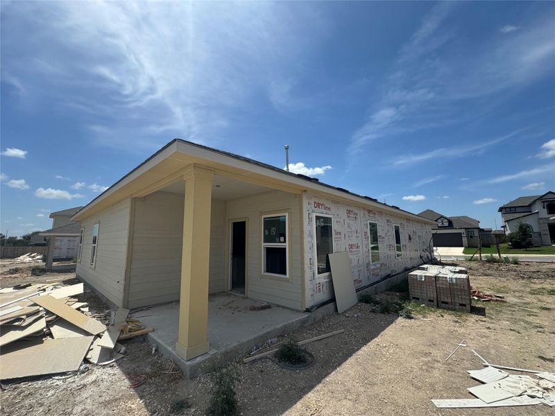 Front exterior of a new home in Village at Three Oaks, Seguin, TX, highlighting curb appeal (Image 11). Front exterior of a new home in Village at Three Oaks, Seguin, TX, highlighting curb appeal (Image 11).