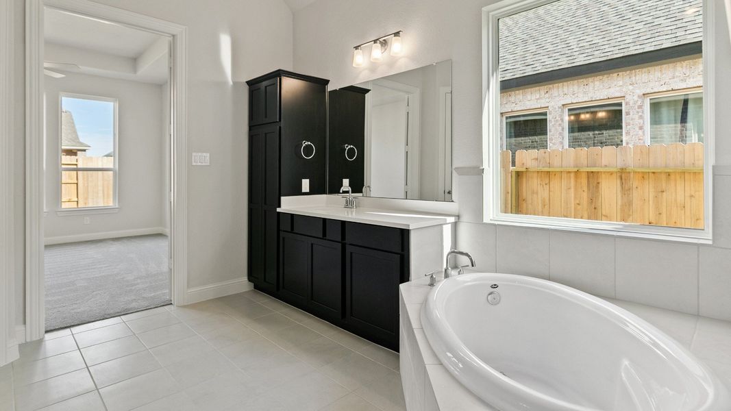 Representative furnished interior of a home built from the Yale by DRB Homes in Brookewater, Rosenberg (Image 13).