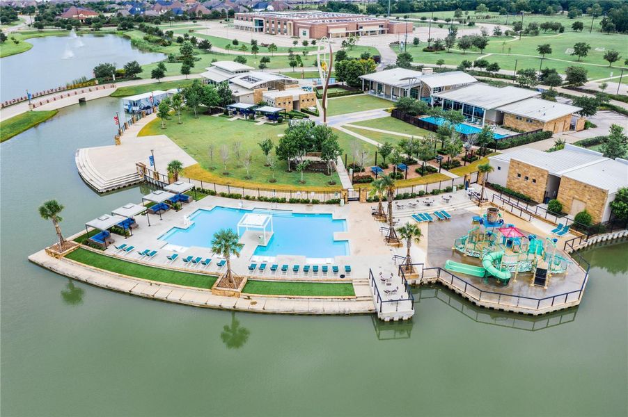 Oasis Village featuring a family pool, kiddie pool, outdoor games, and additional amenities.
