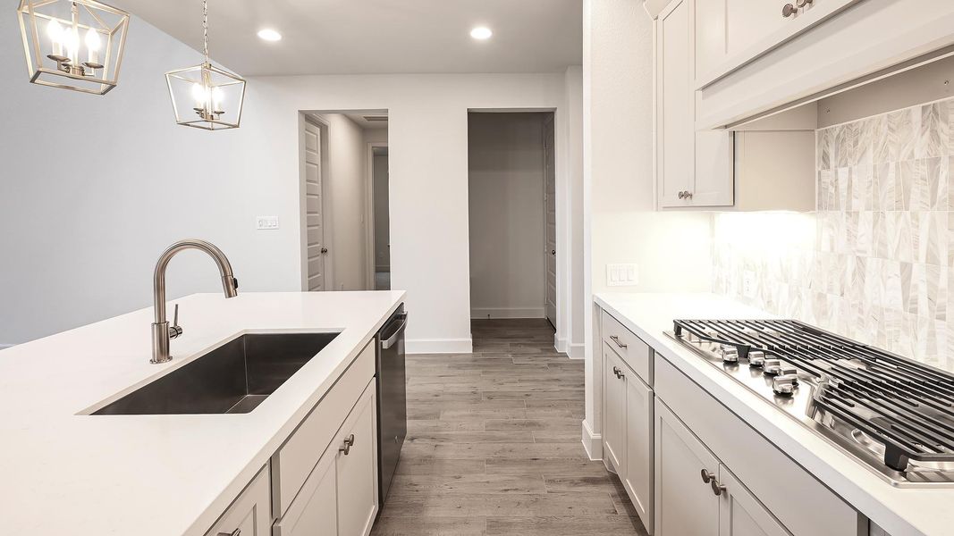 Furnished interior view inside a new home in 6 Creeks 50', Kyle (Image 6).