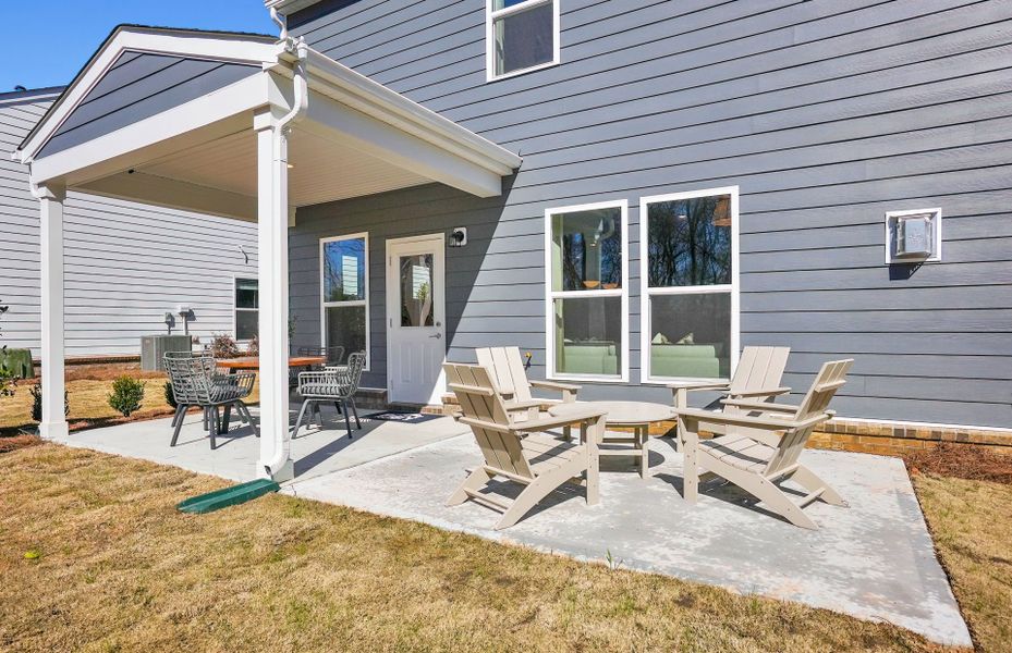 Exterior details and patio area of a home in Riverstone, Monroe (Image 3).