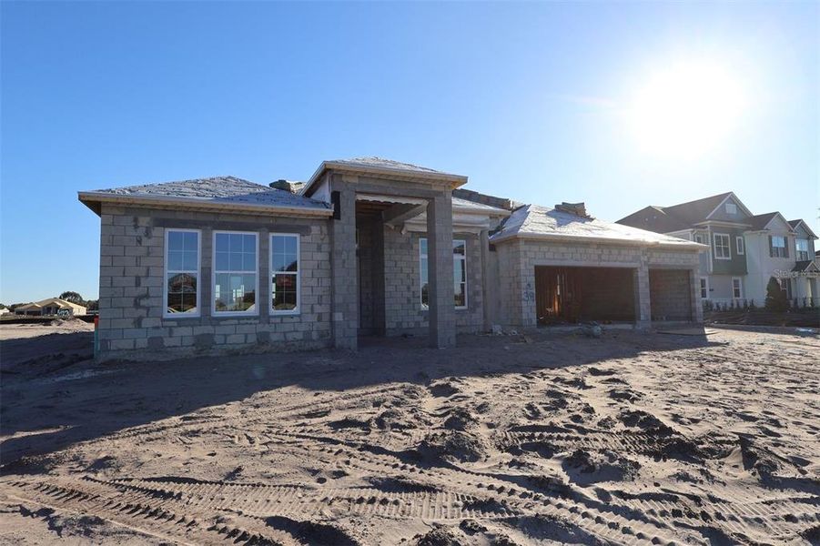 In-progress construction of a new home in Solace at Corner Lake, Orlando, FL (Image 22).