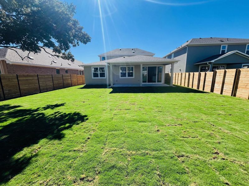 Rear of Home with Private Yard