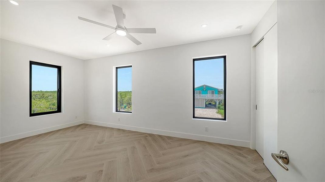 Spacious, unfurnished interior of a new home in , Holmes Beach (Image 23). Spacious, unfurnished interior of a new home in , Holmes Beach (Image 23).