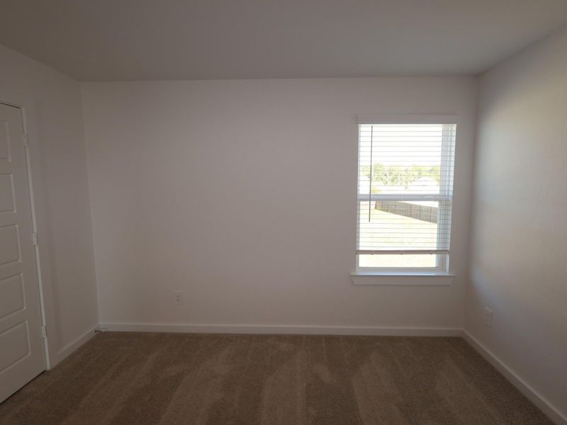 Spacious, unfurnished interior of a new home in Pinewood at Grand Texas, New Caney (Image 15).