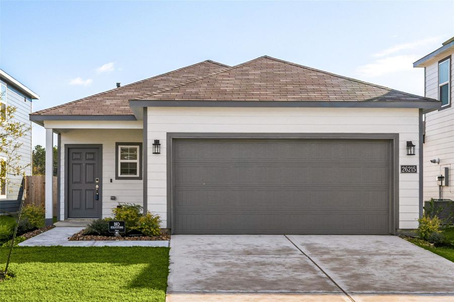 Front exterior of a new home in Northpark South, Porter, TX, highlighting curb appeal (Image 23).