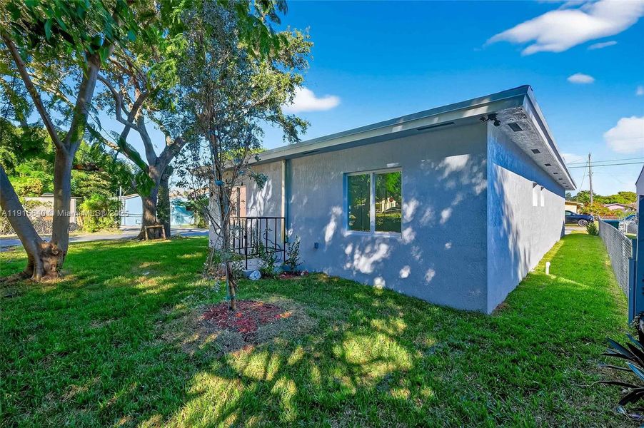 Exterior details and patio area of a home in , Miami (Image 1). Exterior details and patio area of a home in , Miami (Image 1).