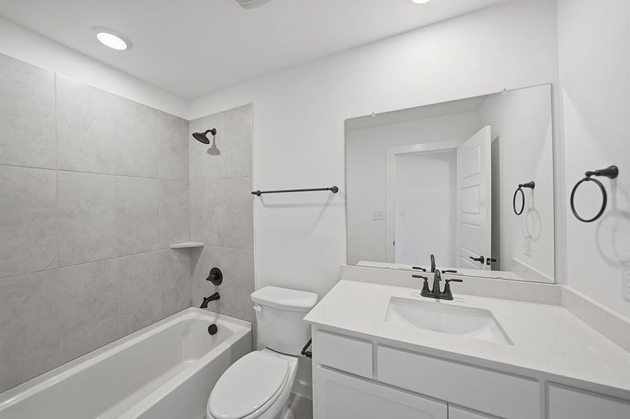 Furnished interior view inside a new home in Light Farms Brenham - 40' Lots, Celina (Image 14).