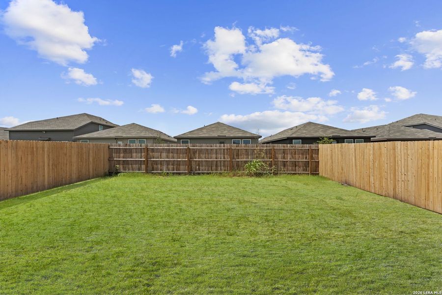 Exterior details and patio area of a home in Higdon Crossing, San Antonio (Image 16).