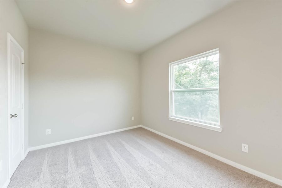 Alternate view of the third bedroom. All bedrooms are upstairs and on the same floor.