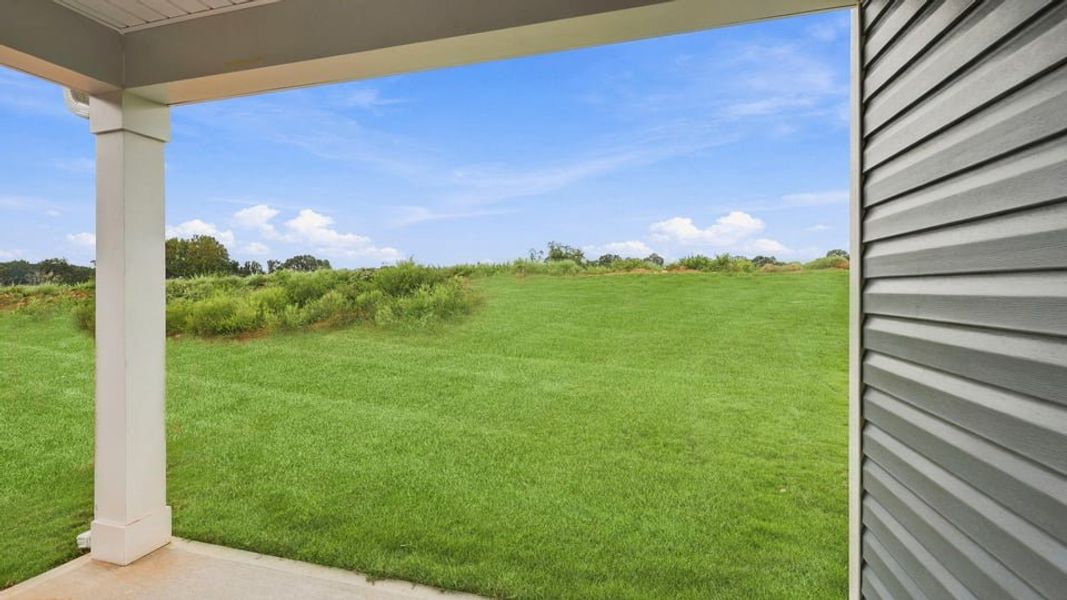 Exterior details and patio area of a home in Lakestone, Woodruff (Image 19).