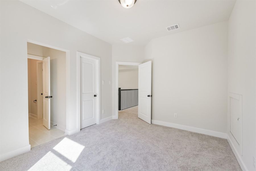 Spacious, unfurnished interior of a new home in The Woodlands Hills – 55', Willis (Image 21).