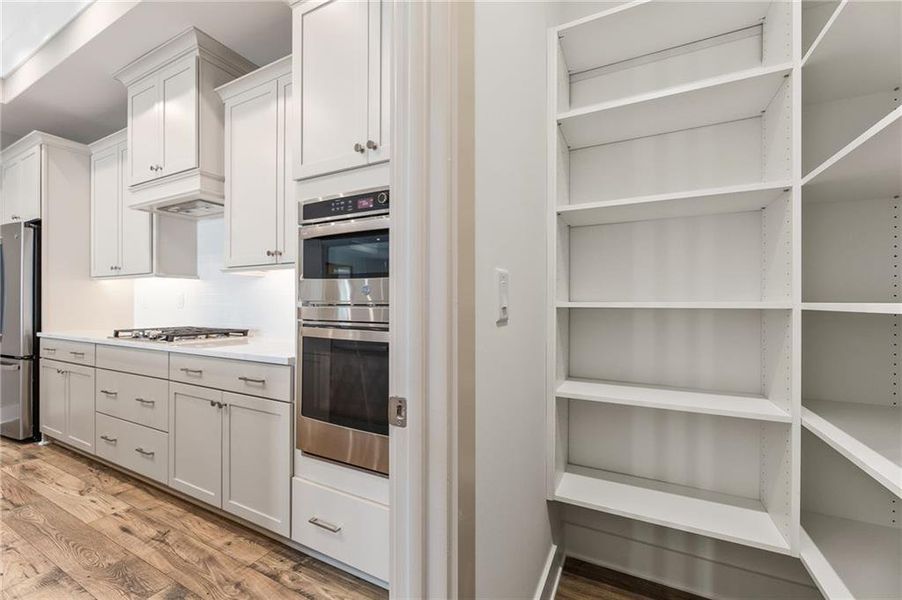 Furnished interior view inside a new home in The Courtyards by The Manor, Alpharetta (Image 14).