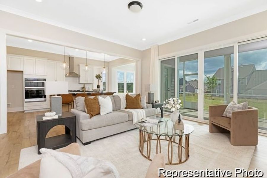 Representative furnished interior of a home built from the Bedford P by True Homes in Homecoming, Ravenel (Image 9).