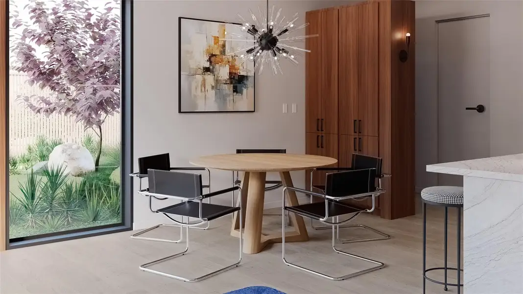 Dining area featuring light wood-type flooring and a chandelier