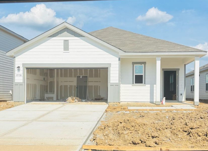 Front exterior of a new home in Cedar Pointe, Crosby, TX, highlighting curb appeal (Image 2). Front exterior of a new home in Cedar Pointe, Crosby, TX, highlighting curb appeal (Image 2).